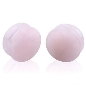 Rose quartz stone ear gauges with double-flared design, pale pink polished natural quartz flesh tunnels for gothic body jewelry