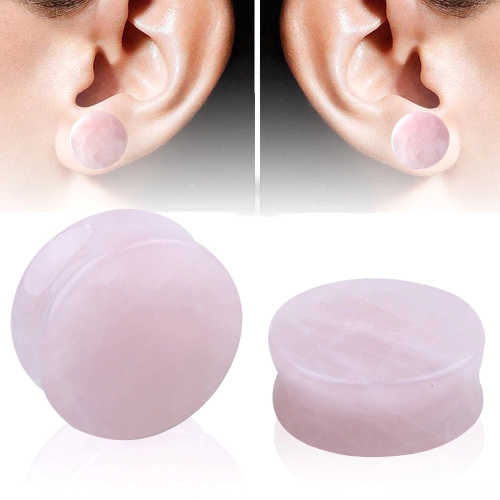 Rose quartz stone ear expander tunnel showing flat round disc shape and natural pink crystal texture for goth body modification