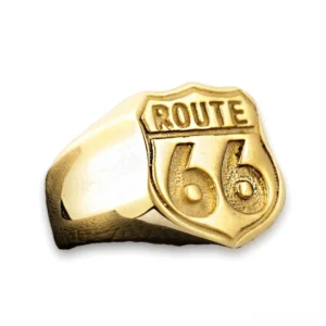Gold-tone Route 66 embossed shield ring for men, side-front angle showcasing biker jewelry design