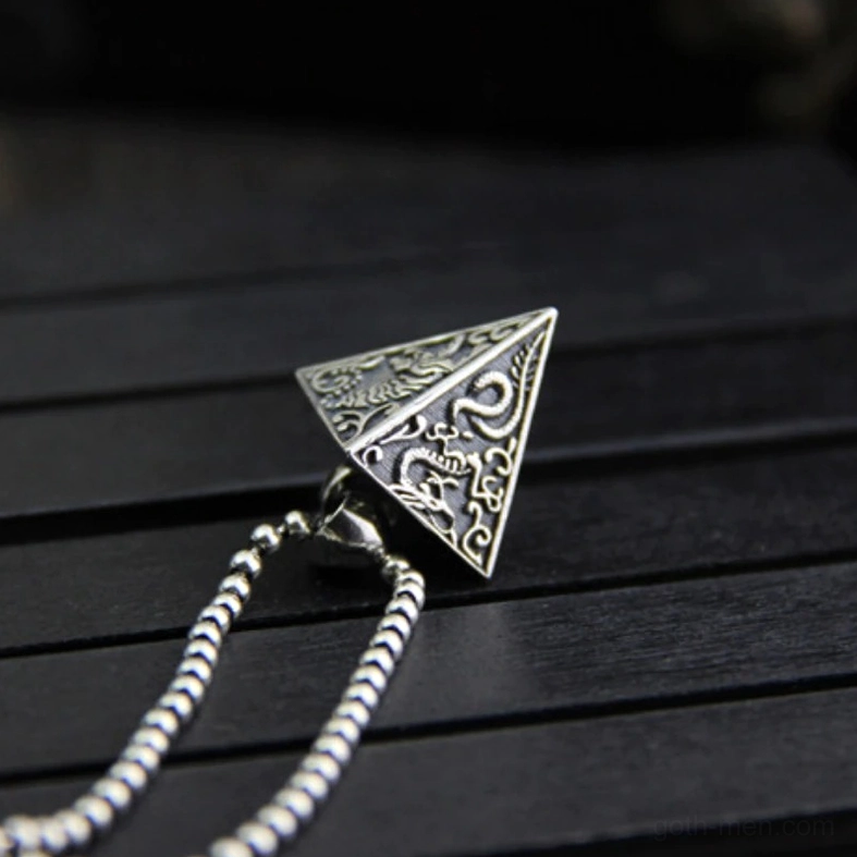 Sterling S925 silver pyramid pendant with hand-embossed mystical animal symbols and oxidized gothic finish for alternative jewelry styling