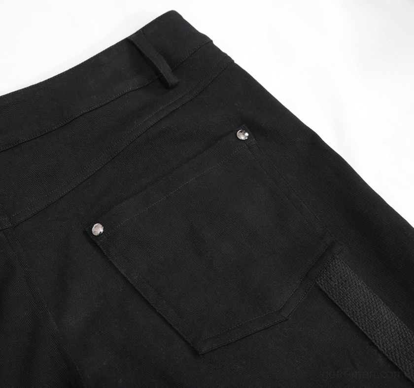 Gothic shorts back pocket section with metal rivet buttons and D-ring strap attachment