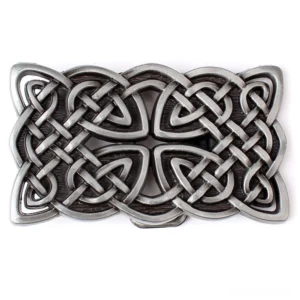 Silver Celtic cross gothic belt buckle with hollowed knot pattern, flat lay top view