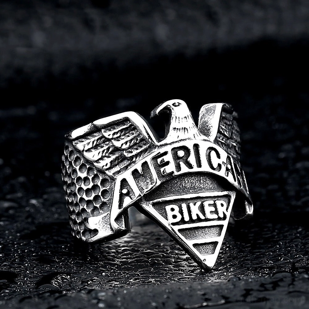 Silver tone gothic eagle biker ring side view with hammered texture and intricate eagle motif