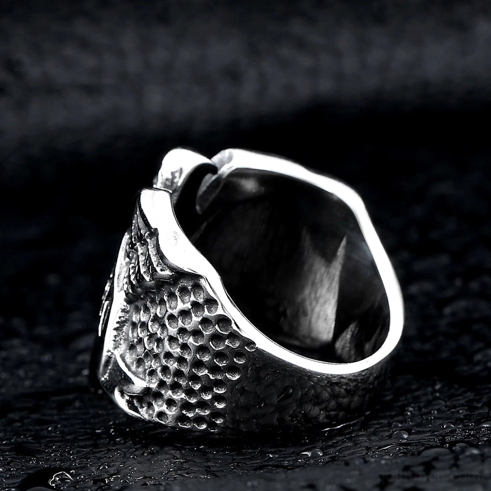 Sterling silver eagle biker ring front angle with engraved motifs and professional studio lighting