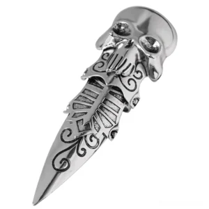 Silver gothic skull claw ring - top-down flat lay view with intricate scroll engravings and jointed pointed design