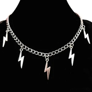 Silver lightning bolt choker necklace with five dangling geometric pendants on display mannequin against black background
