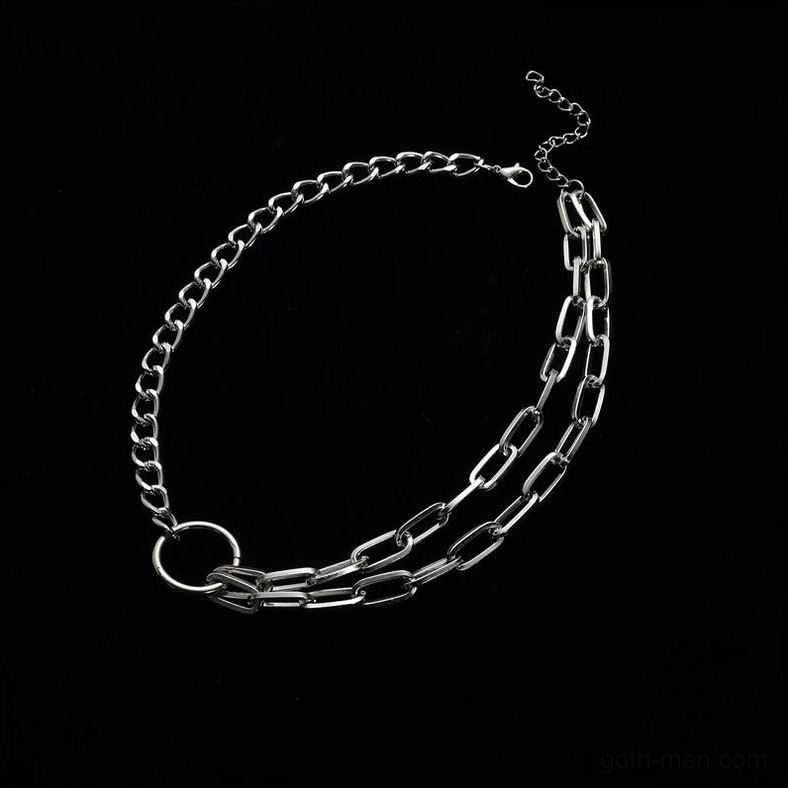 Silver gothic chain necklace flat lay - mixed link chain choker with geometric circular connector detail shot