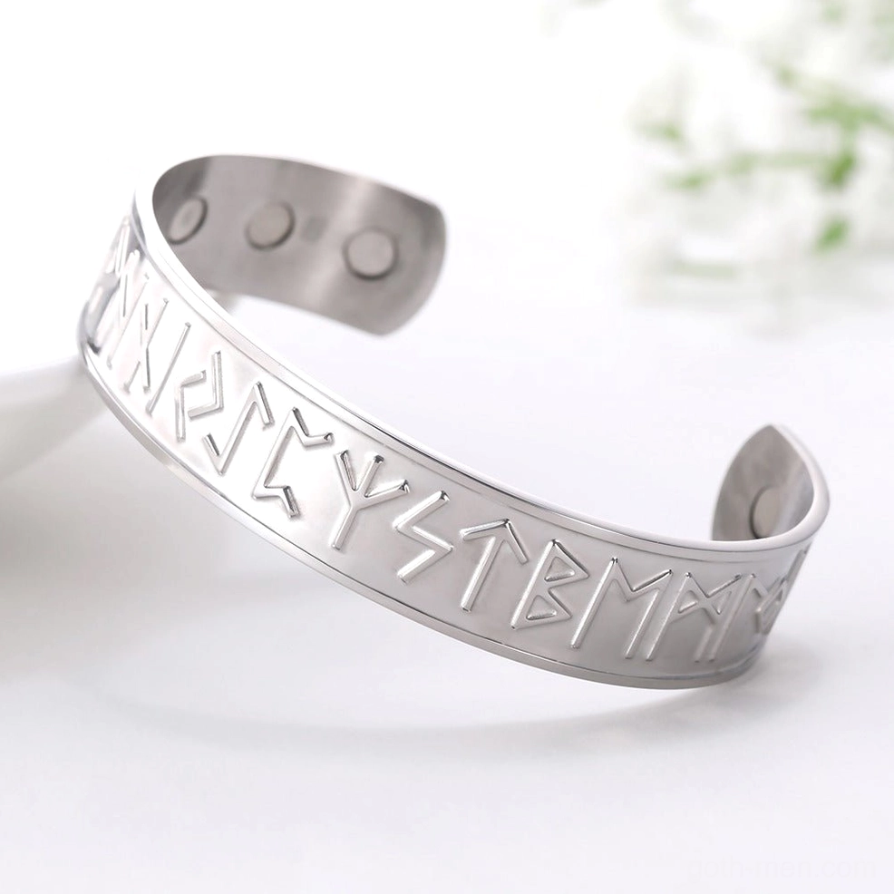All silver stainless steel Nordic rune open cuff bracelet with deeply engraved Viking rune symbols, top side view