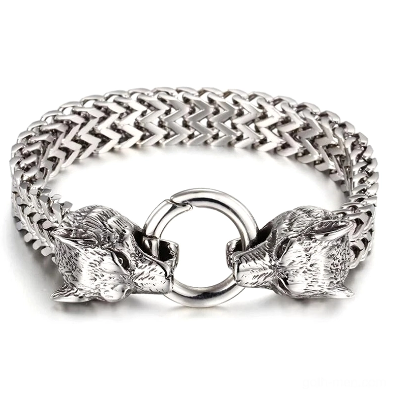 Silver tone wolf head gothic stainless steel bracelet woven chain texture flat lay