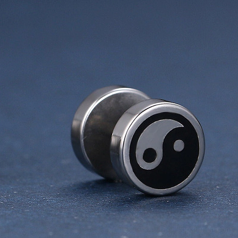 Single Tai Chi stud earring close-up, polished stainless steel with classic black white yin yang design and secure push-back post