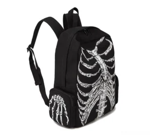 Three-quarter side view of skeleton print backpack showing adjustable shoulder straps and side pocket design