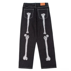 Skeleton hand bone print gothic jeans rear view, black distressed denim with bone embroidery on back pockets