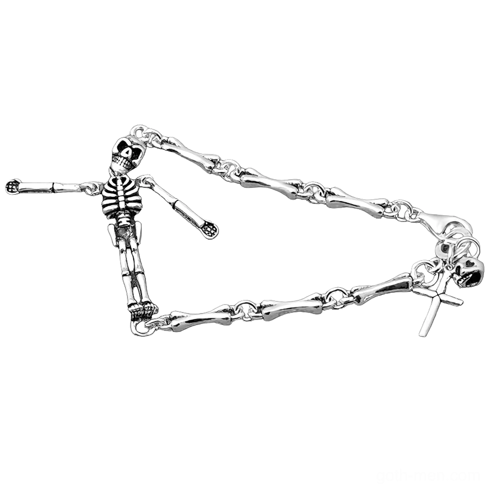 Sterling silver skeleton bracelet with cross toggle clasp, flat lay top view showing detailed bone-link chain and gothic pendant