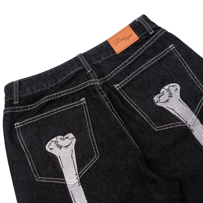 Skeleton hand bone print gothic jeans back pocket embroidery detail, alternative fashion styling