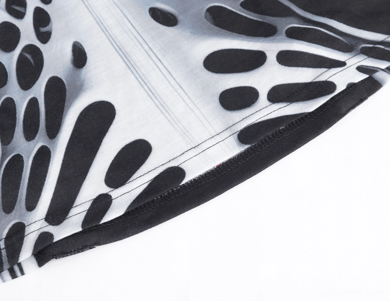 Skeleton print and fabric texture close-up with black binding trim edge detail