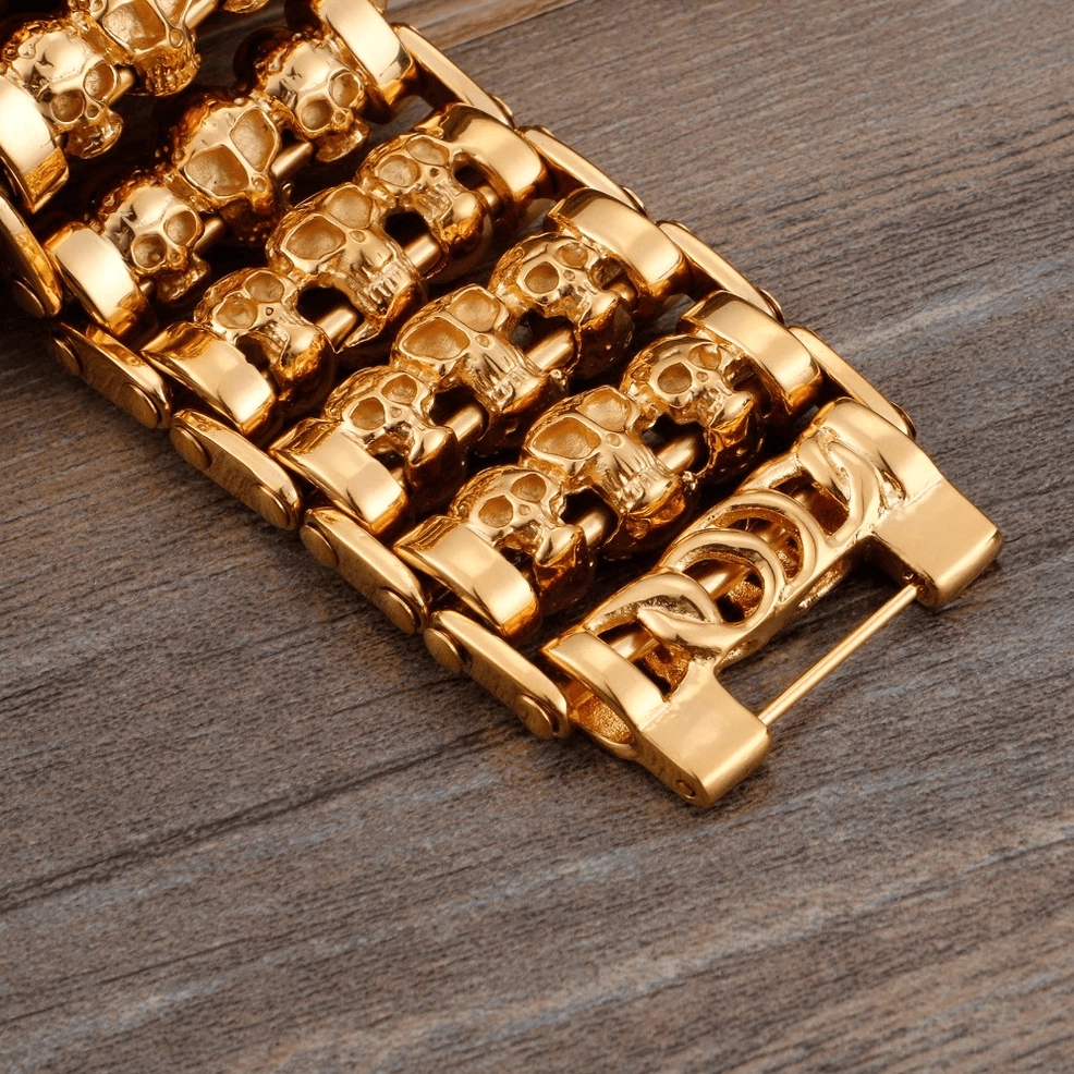 Close-up detail of gothic skull chain bracelet showing hollow carved skull structure and metalwork