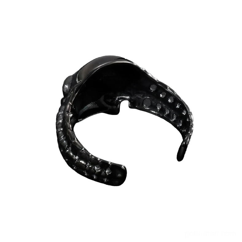Black skull stainless steel bracelet rear view showing perforated inner cuff structure and spine-pattern detail