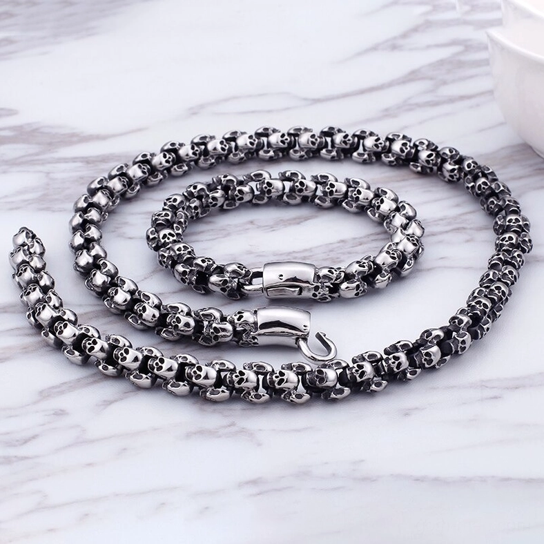 Gothic skull bracelet wrist try-on showing scale and fit of stainless steel chain design