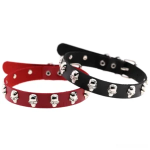 Multiple adjustable leather skull chokers flat lay display showing burgundy wine red and black color options