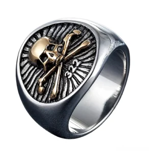 Gold skull and crossbones pirate signet ring with 322 marking, side profile on white background