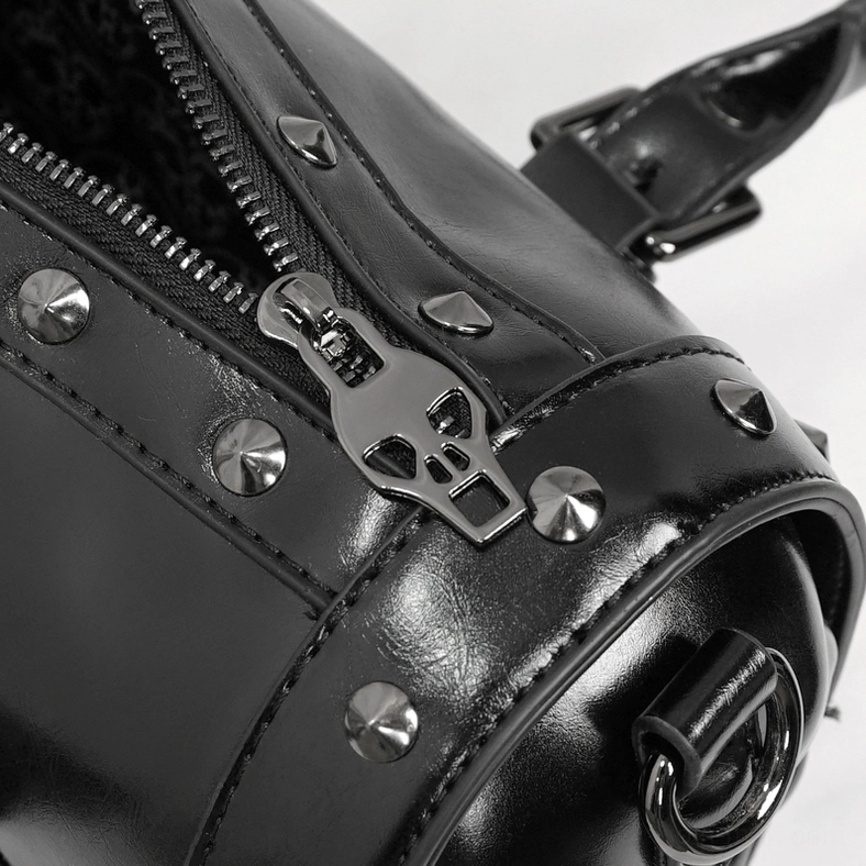 Black gothic bowling bag with dimensional skull design and metal rivets, alternative subculture accessory