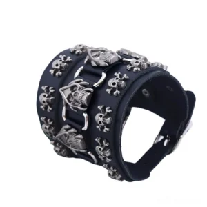 Side profile of gothic punk skull leather bracelet showing multi-row skull decoration and adjustable buckle design