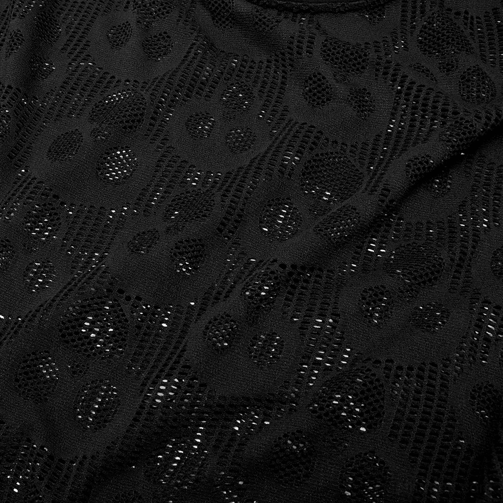 Detailed view of hollow mesh weave with embossed skull print pattern