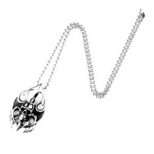 Stainless steel skull pendant necklace with beaded chain, hanging display on white studio background