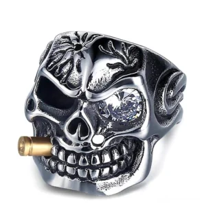 Pirate skull biker ring stainless steel with crystal eye oblique angle showing intricate gothic engraving