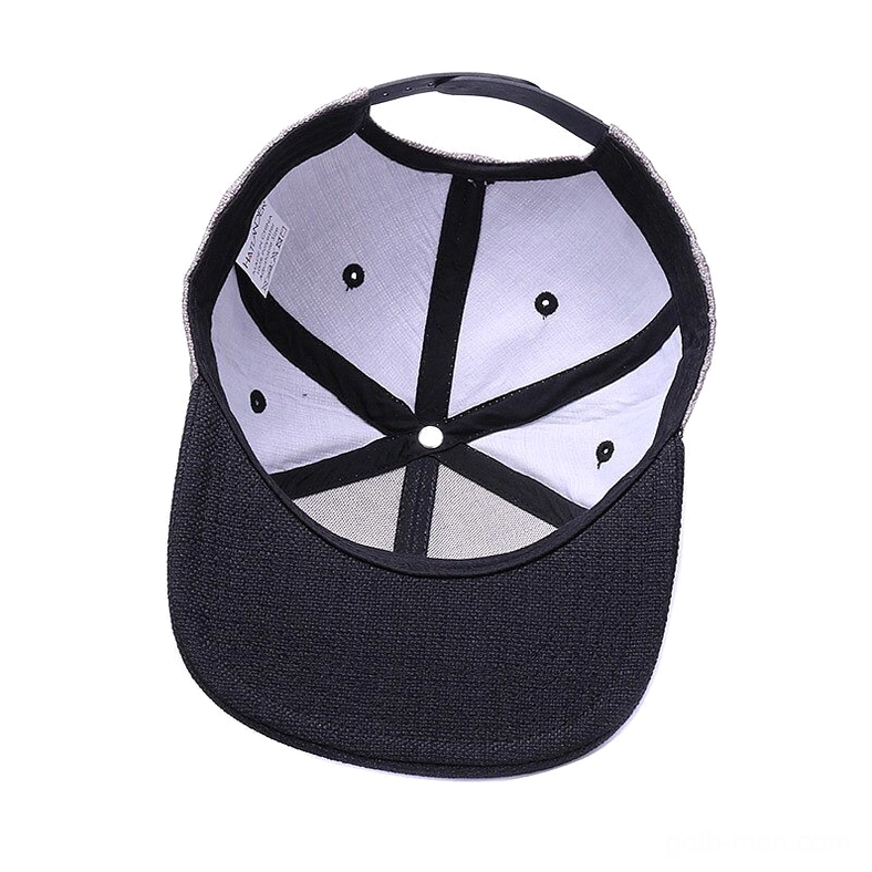 Interior view of skull ride hard snapback cap showing white inner lining and black woven brim fabric construction detail