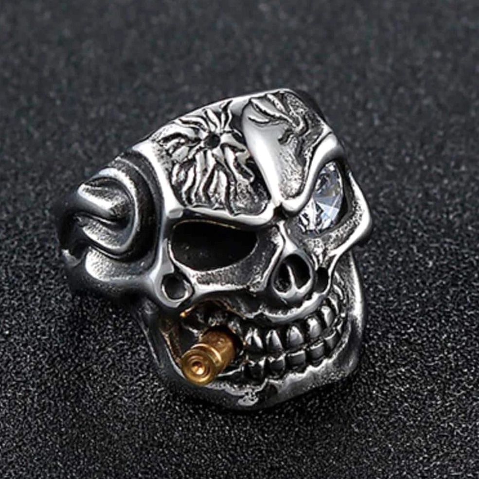 Skull pirate biker ring top view dark background showing 3D sculpted bone detail and crystal placement