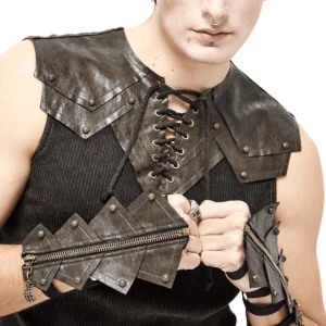 Man in gothic makeup displaying brown fingerless gloves with brass hardware and layered wrist straps, alternative fashion