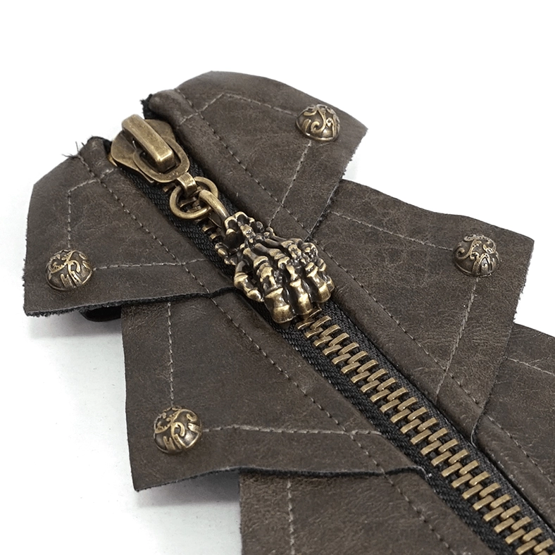 Detailed view of skull-shaped zipper puller on brown synthetic leather fingerless glove