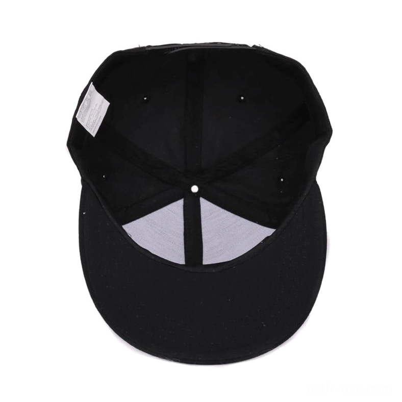 Interior top view of black cotton snapback cap showing size tag and fabric lining detail