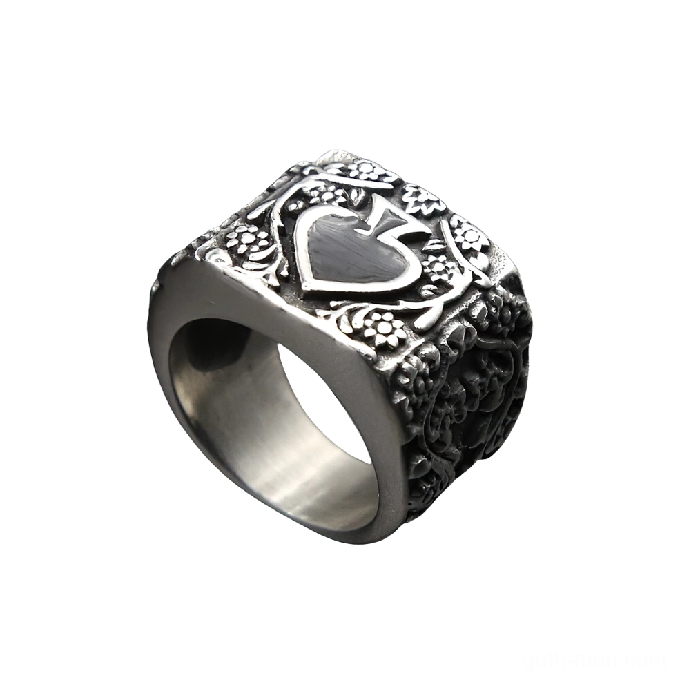 Vintage gothic spade men's ring low angle side view, heart spade emblem with detailed floral engravings on silver band