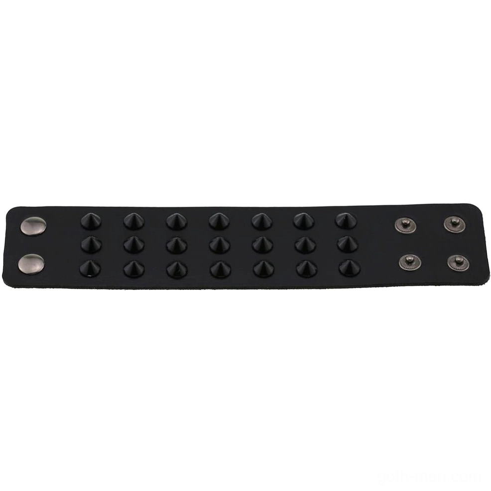 Unfinished spike bracelet leather base showing pre-drilled mounting holes and metal snap button components