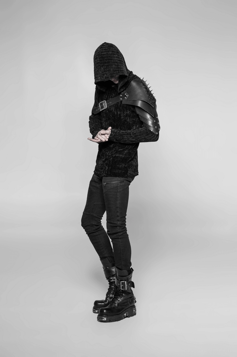 Spiked shoulder harness overall product shot showing complete buckle system and spike placement