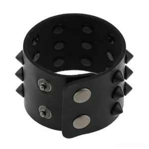 Spike studded wrap bracelet interior top-down view showing adjustable rivet holes and metal snap fastener system