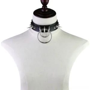 Industrial gothic spiked choker displayed on white mannequin torso showing front wear positioning
