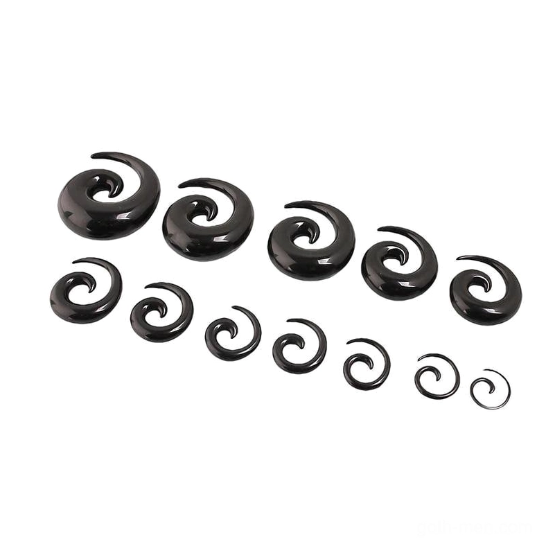 Assorted black spiral taper stretchers, organized by size from large to small, studio product photography
