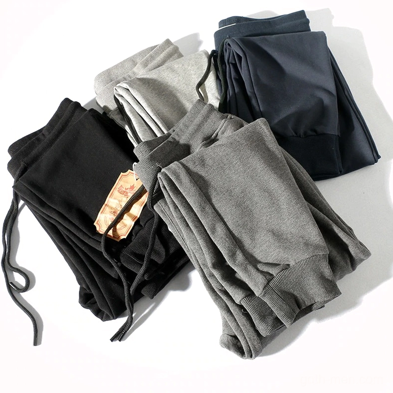 Side-by-side stacked gothic harem joggers showing multiple color options with drawstring waistbands
