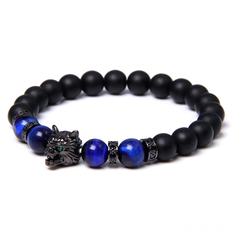 Stacked wolf bracelets in multiple colors showing gothic layering styling, elastic beaded natural stone design