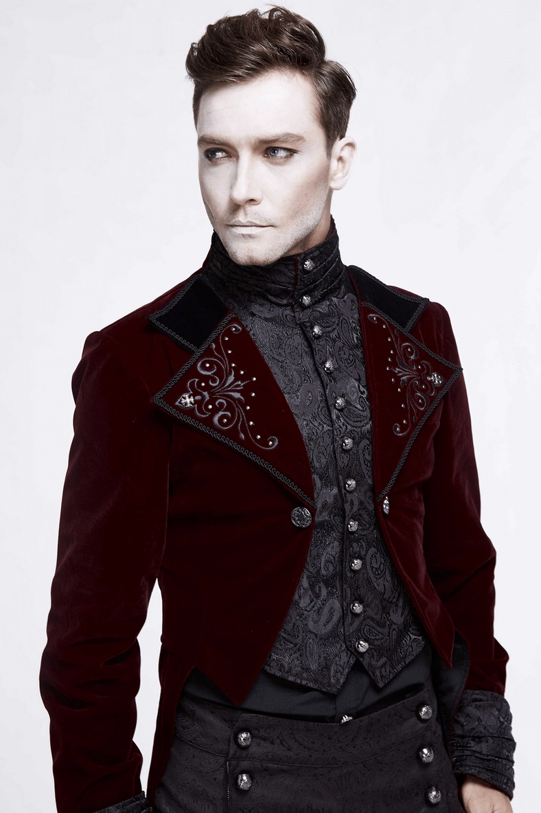 Close-up of intricate embroidered lapel details on wine red velvet steampunk coat showing craftsmanship