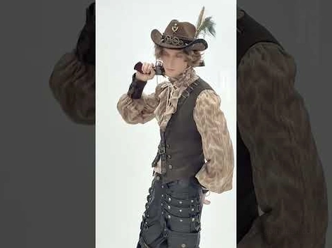 Steampunk gothic hat with feather trim and vintage styling, three-quarter view