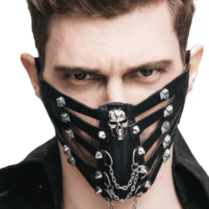 Black steampunk gothic synthetic leather face mask with spike studs and skull ornaments frontal close-up on male model