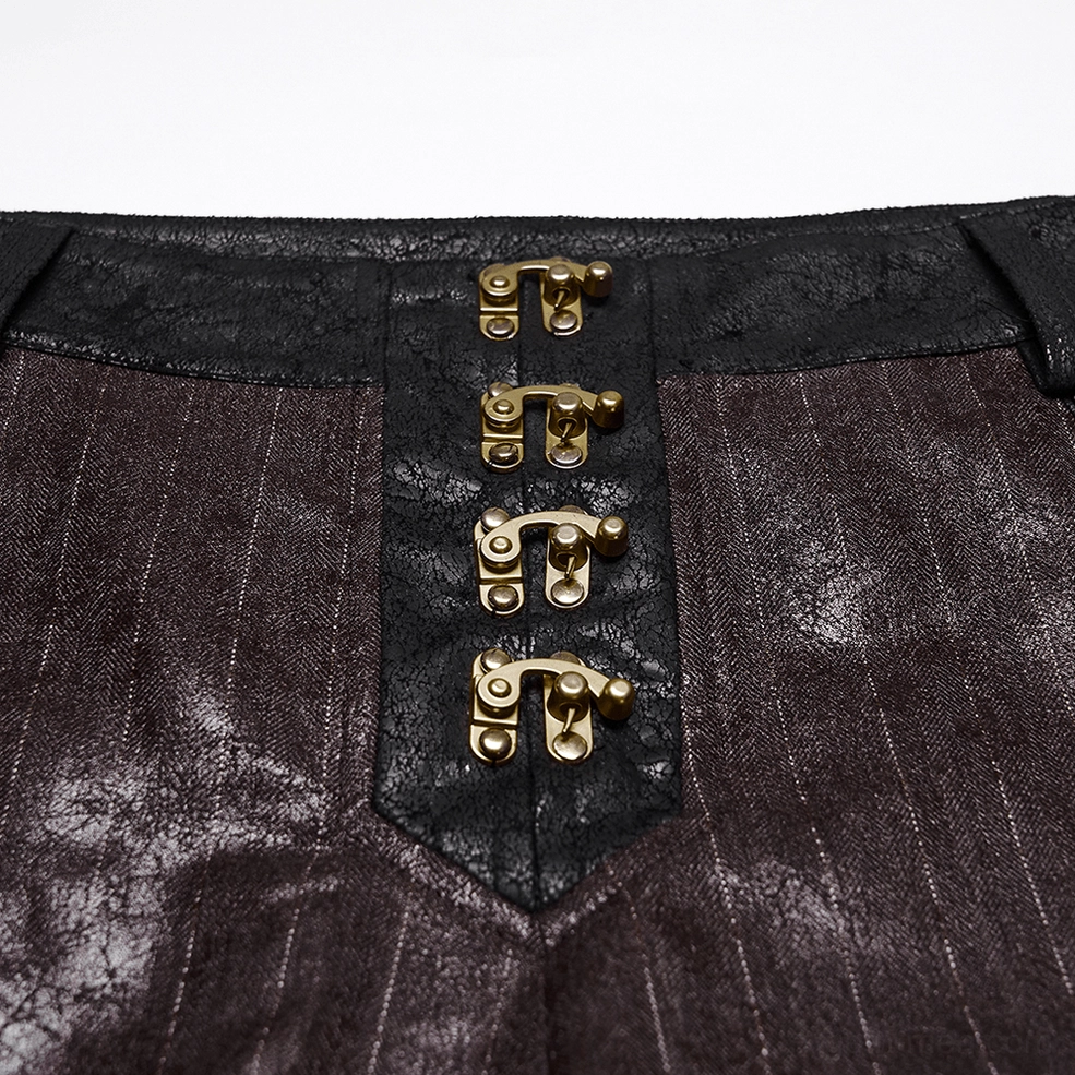 Close-up of antique gold metal clasp details on brown pinstriped steampunk faux leather pants