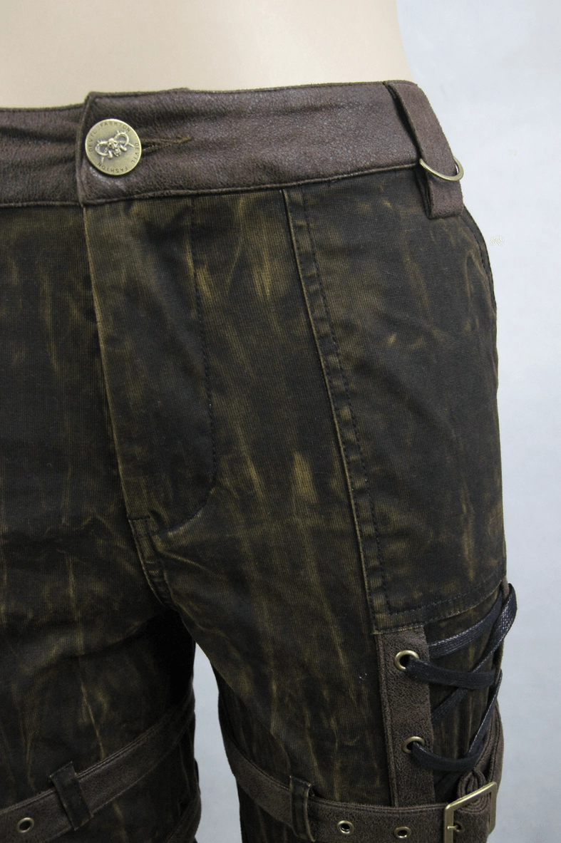 Close-up side view of steampunk pants waistband showing contrast band, metal button closure, and lace-up hardware details