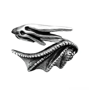 Sterling silver dragon wing gothic ring, left side oblique view showing embossed scale texture and antique silver finish