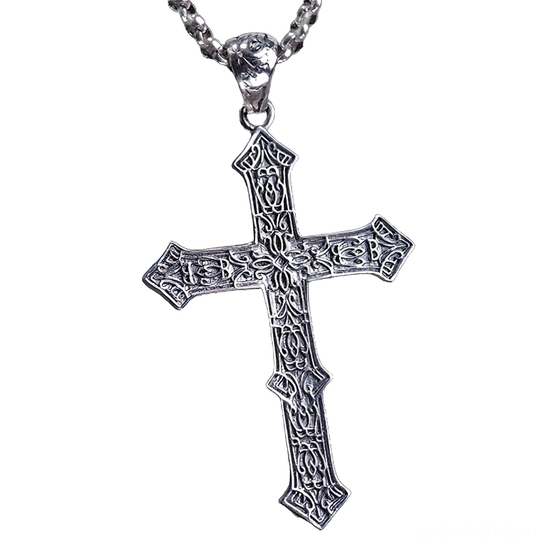 Detailed front perspective of silver skull cross pendant showing intricate relief carving and vintage patina finish for gothic necklace