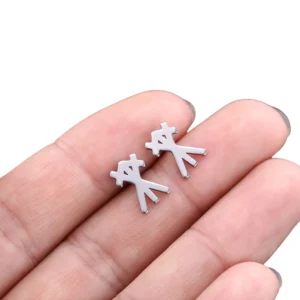 Stick-figure rune stud earrings pair - dual matte silver hollow earrings close-up detail shot